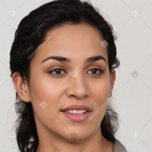 Joyful latino young-adult female with long  brown hair and brown eyes