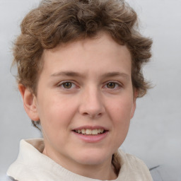 Joyful white child female with short  brown hair and brown eyes