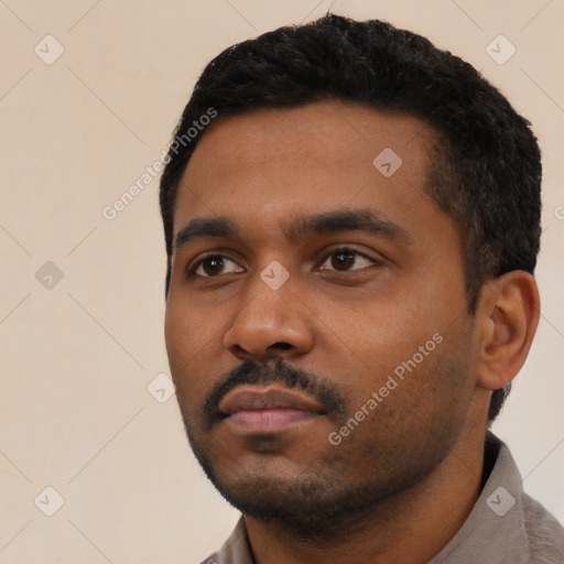 Neutral latino young-adult male with short  black hair and brown eyes