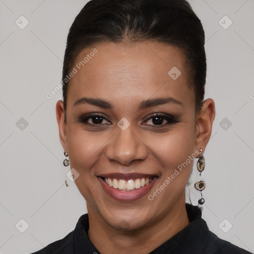 Joyful latino young-adult female with short  brown hair and brown eyes