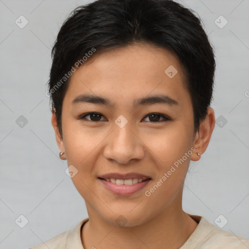 Joyful asian young-adult female with short  brown hair and brown eyes