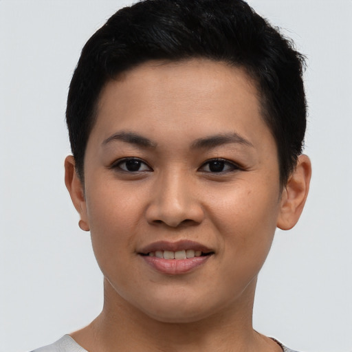 Joyful asian young-adult female with short  black hair and brown eyes