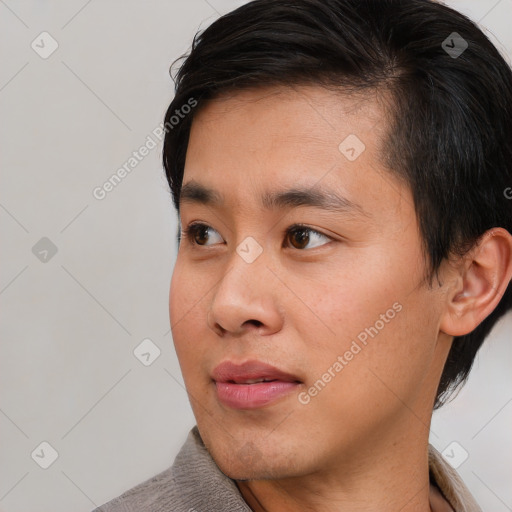 Neutral asian young-adult male with short  brown hair and brown eyes