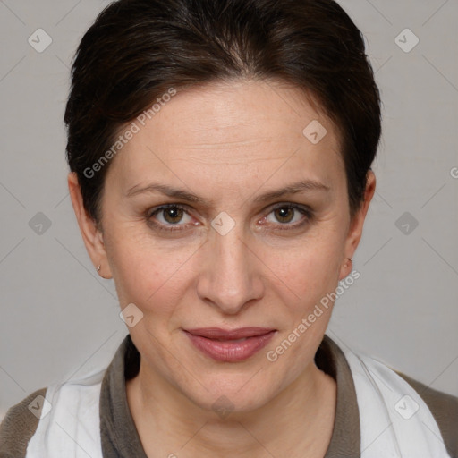 Joyful white adult female with medium  brown hair and brown eyes