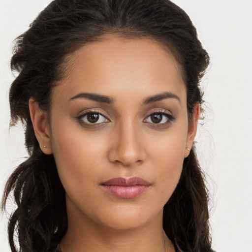 Joyful white young-adult female with long  brown hair and brown eyes