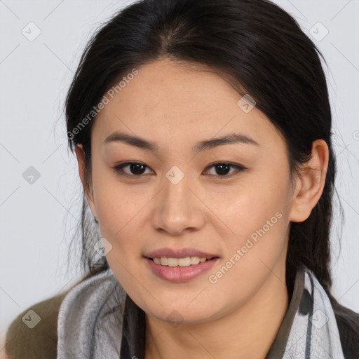 Joyful asian young-adult female with long  brown hair and brown eyes