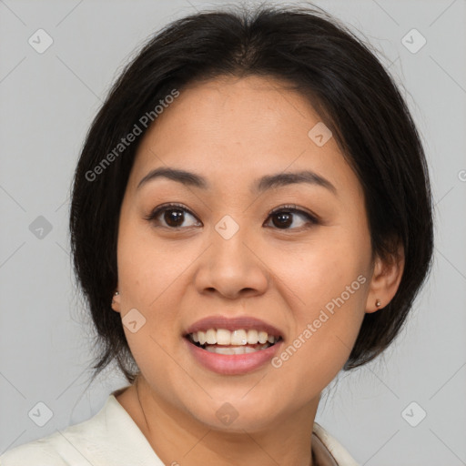 Joyful asian young-adult female with medium  brown hair and brown eyes