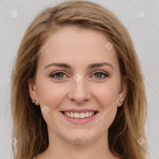 Joyful white young-adult female with long  brown hair and green eyes