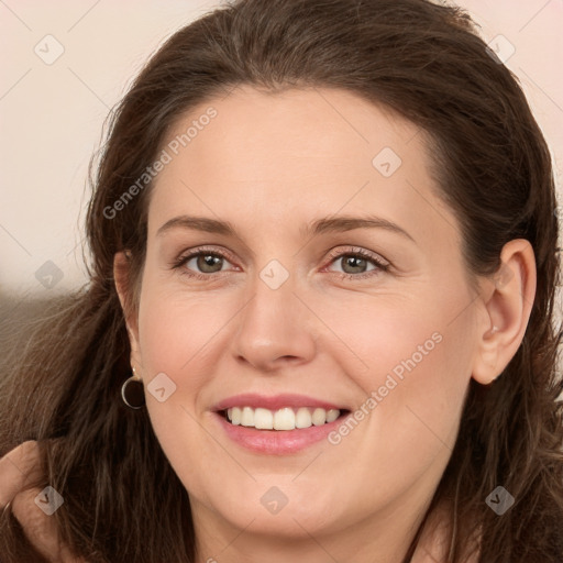 Joyful white young-adult female with long  brown hair and green eyes