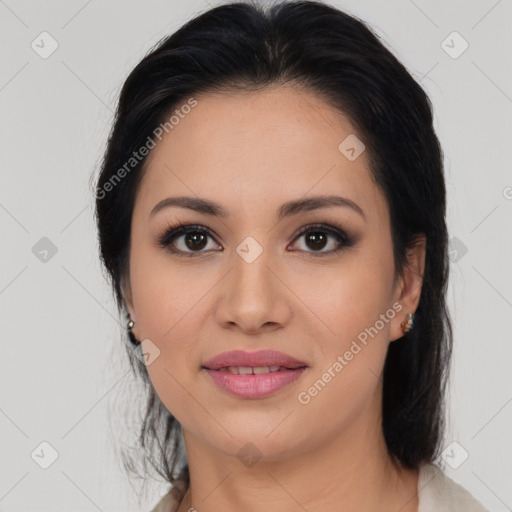 Joyful latino young-adult female with medium  brown hair and brown eyes