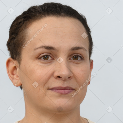 Joyful white adult female with short  brown hair and brown eyes