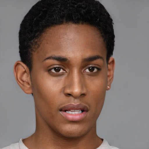 Neutral black young-adult female with short  black hair and brown eyes
