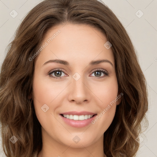 Joyful white young-adult female with long  brown hair and green eyes