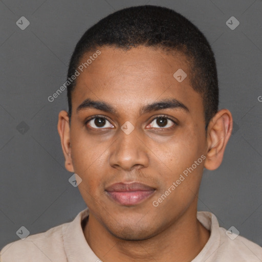 Joyful black young-adult male with short  brown hair and brown eyes