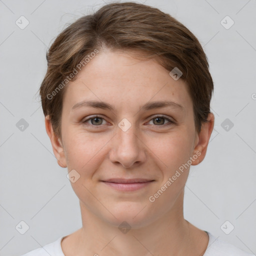 Joyful white young-adult female with short  brown hair and grey eyes