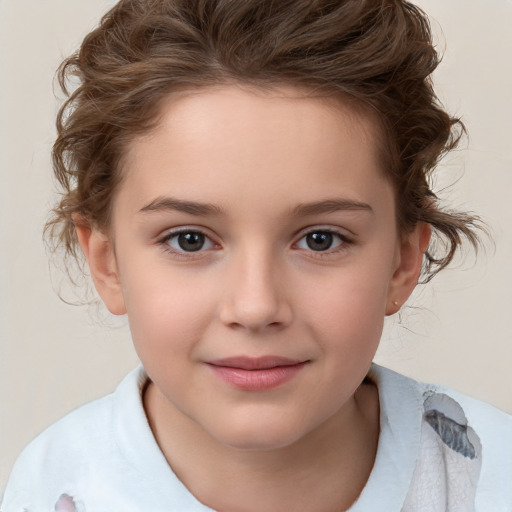 Joyful white child female with medium  brown hair and brown eyes