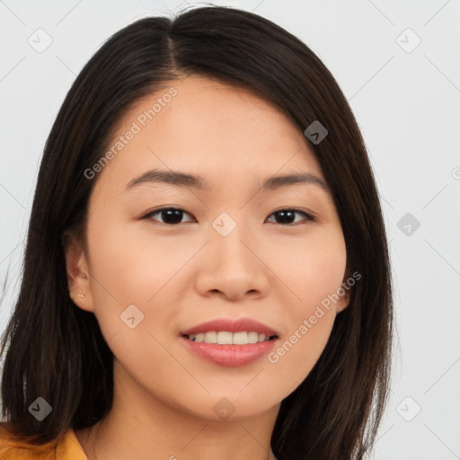 Joyful asian young-adult female with long  brown hair and brown eyes