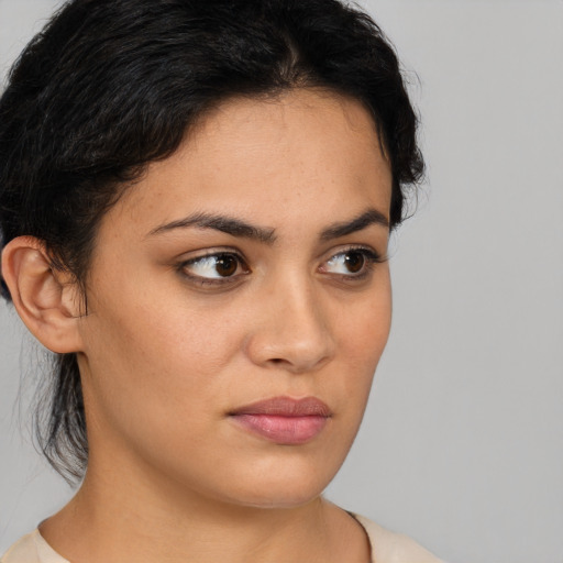 Neutral white young-adult female with medium  brown hair and brown eyes