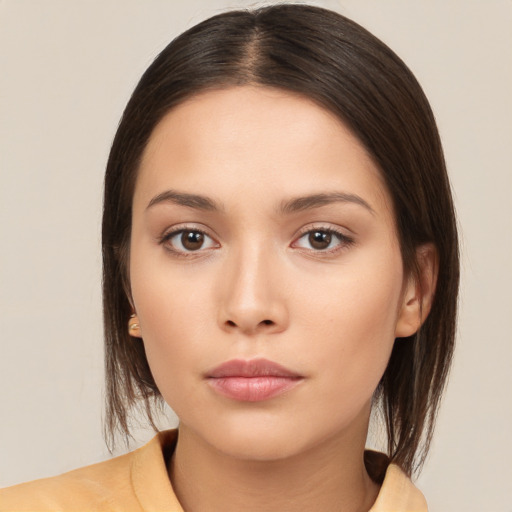 Neutral white young-adult female with medium  brown hair and brown eyes