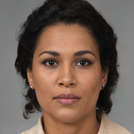 Neutral latino young-adult female with medium  brown hair and brown eyes