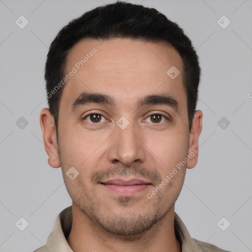 Joyful white young-adult male with short  black hair and brown eyes