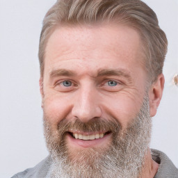 Joyful white adult male with short  brown hair and grey eyes