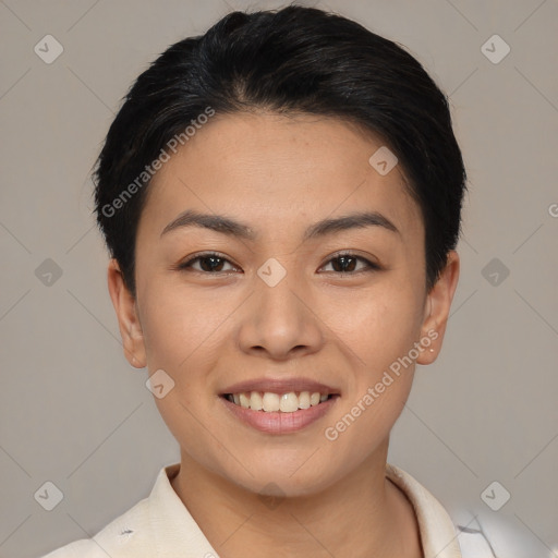 Joyful asian young-adult female with short  brown hair and brown eyes