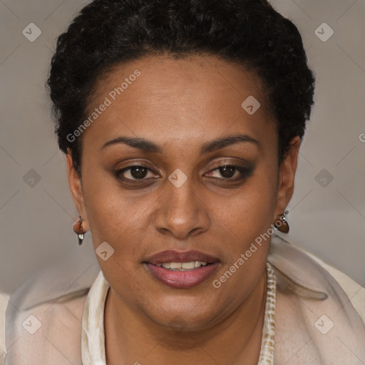 Joyful black young-adult female with short  brown hair and brown eyes