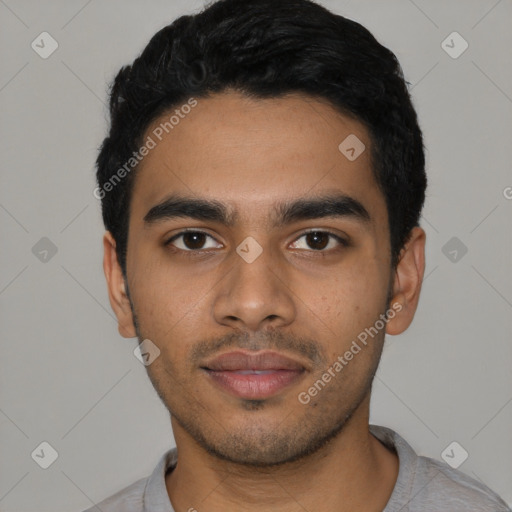 Neutral latino young-adult male with short  black hair and brown eyes