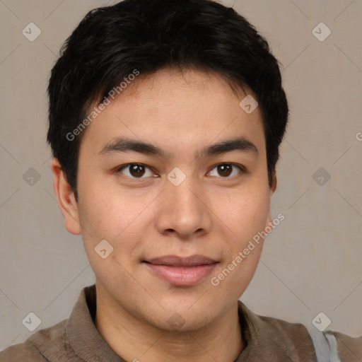 Joyful asian young-adult male with short  brown hair and brown eyes