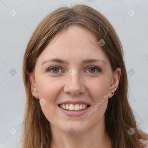 Joyful white young-adult female with long  brown hair and grey eyes