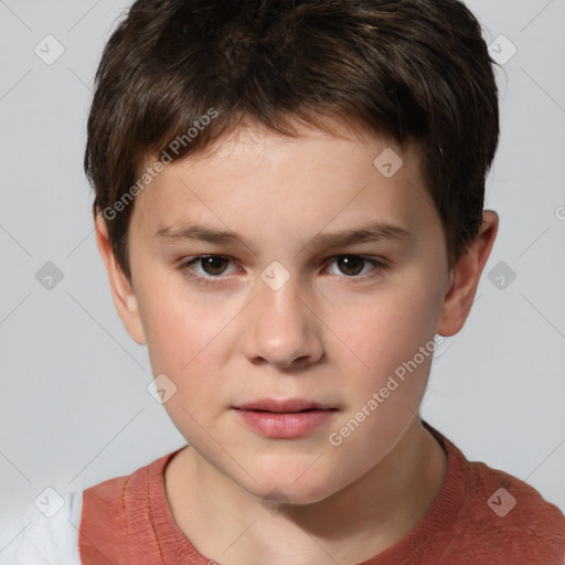 Joyful white child male with short  brown hair and brown eyes