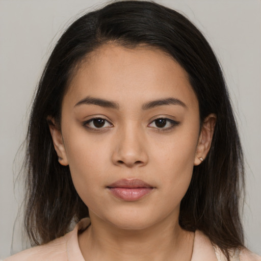 Neutral asian young-adult female with medium  brown hair and brown eyes