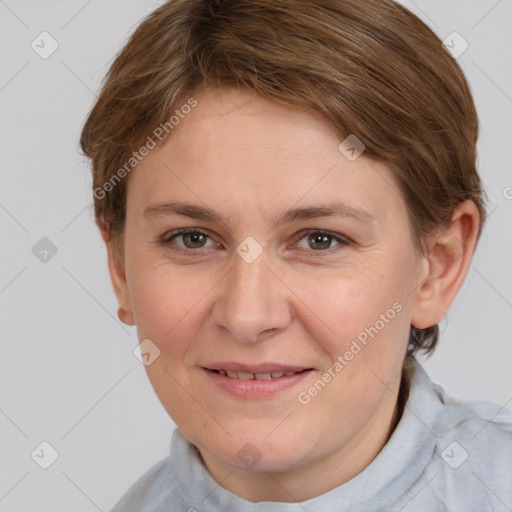 Joyful white adult female with short  brown hair and grey eyes