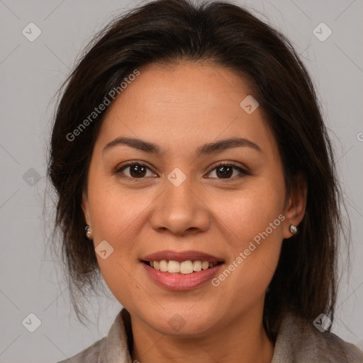 Joyful white young-adult female with long  brown hair and brown eyes