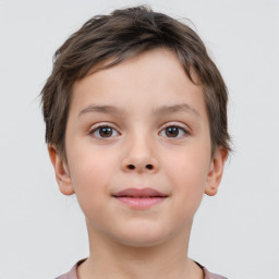 Joyful white child female with short  brown hair and brown eyes