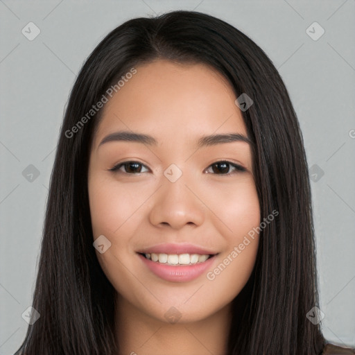 Joyful white young-adult female with long  black hair and brown eyes