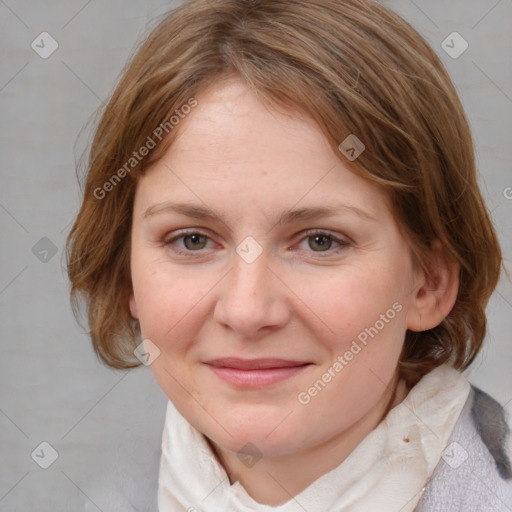 Joyful white young-adult female with medium  brown hair and blue eyes