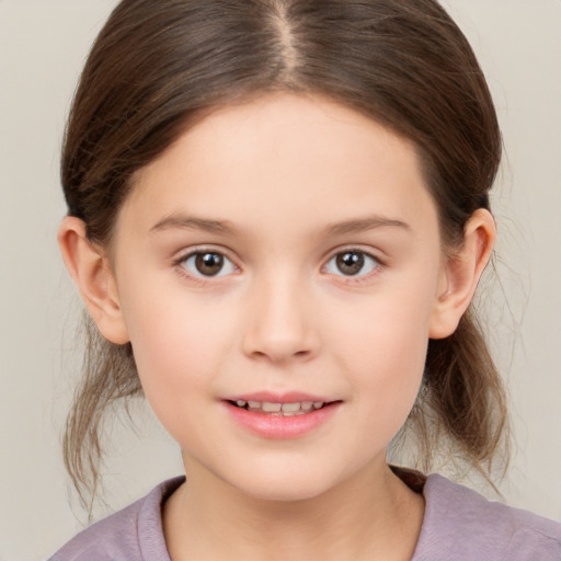 Joyful white child female with medium  brown hair and brown eyes