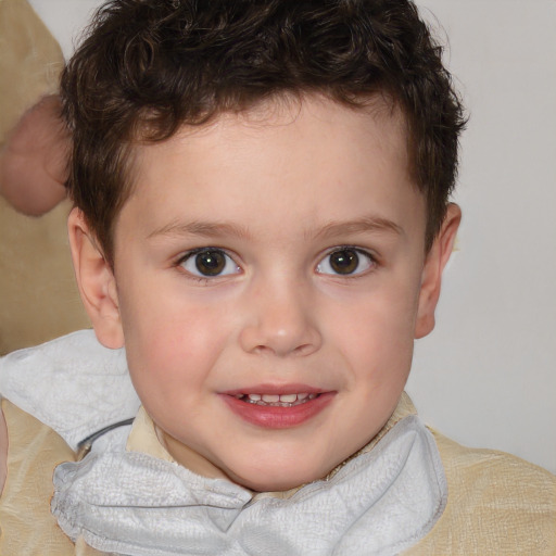 Joyful white child male with short  brown hair and brown eyes