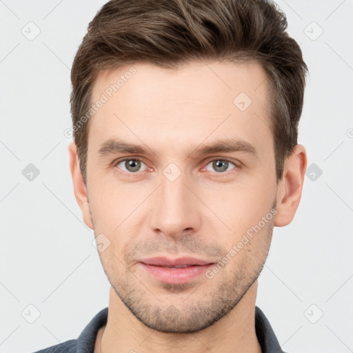 Neutral white young-adult male with short  brown hair and brown eyes