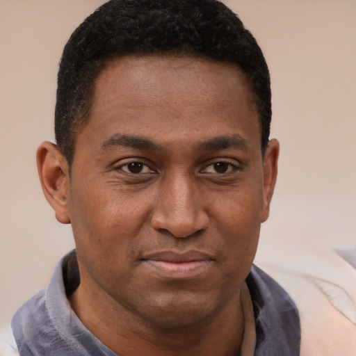 Neutral latino young-adult male with short  brown hair and brown eyes