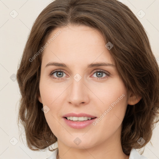 Joyful white young-adult female with medium  brown hair and green eyes