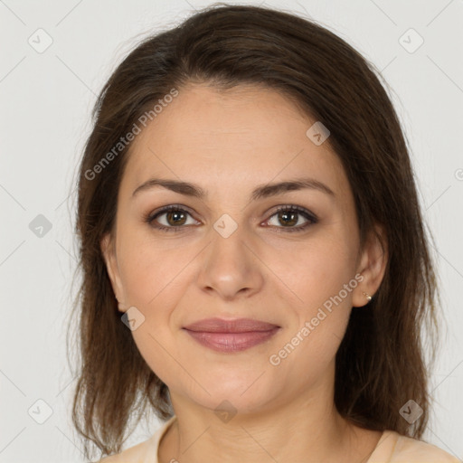 Joyful white young-adult female with medium  brown hair and brown eyes