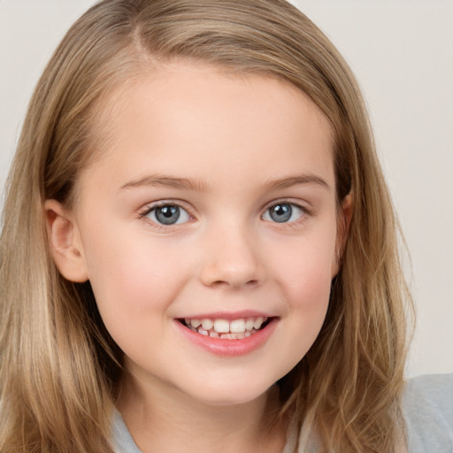 Joyful white child female with long  brown hair and grey eyes