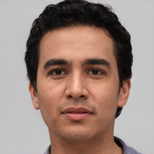 Neutral white young-adult male with short  black hair and brown eyes