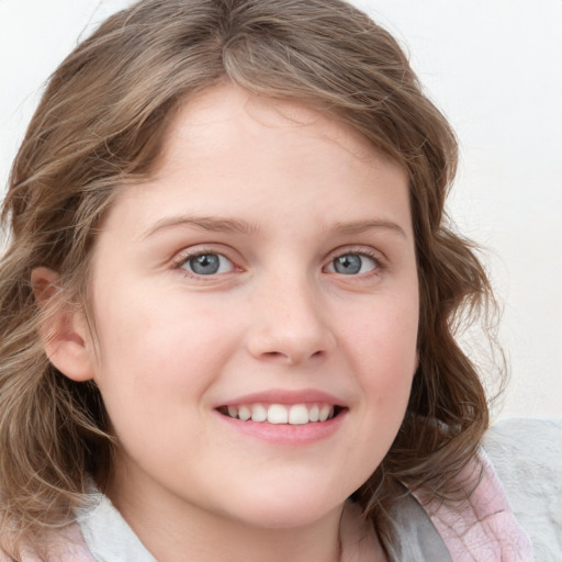 Joyful white child female with medium  brown hair and blue eyes