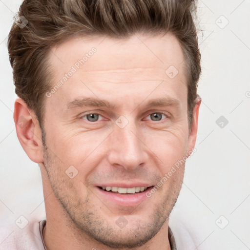 Joyful white adult male with short  brown hair and grey eyes