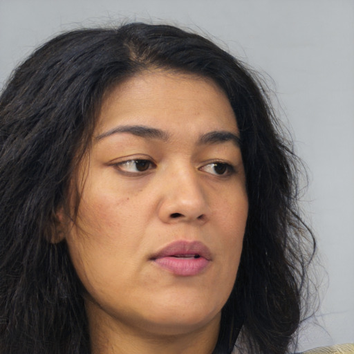 Neutral asian young-adult female with medium  brown hair and brown eyes