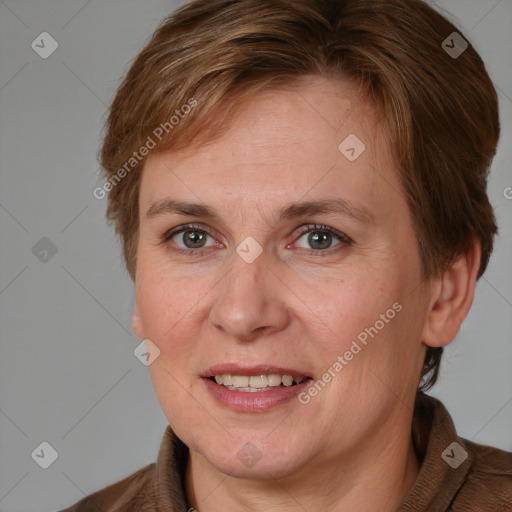 Joyful white adult female with short  brown hair and brown eyes